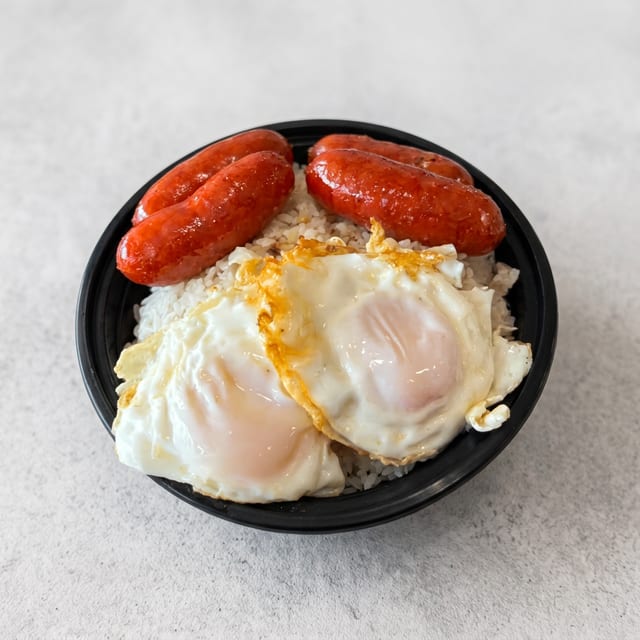 Longsilog (Pork Longanisa) Served with Garlic Rice and 2 Eggs.